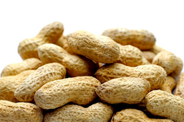 Roasted peanuts in shell on white background.
