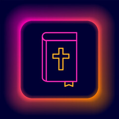 Obraz premium Glowing neon line Holy bible book icon isolated on black background. Colorful outline concept. Vector