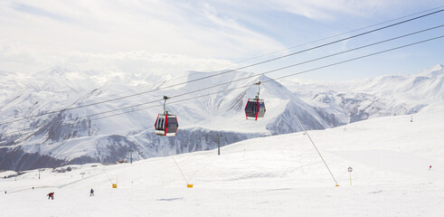 Gudauri Ski Resort: Gondola (Ski Lift) and Snow-covered Caucasus Mountains in Distance - Gudauri,...