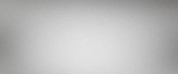 Subtle gradient and grainy texture on metallic background