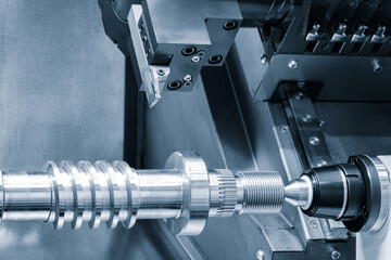 Modern metalworking cnc machine for cutting, drilling, milling metal details.