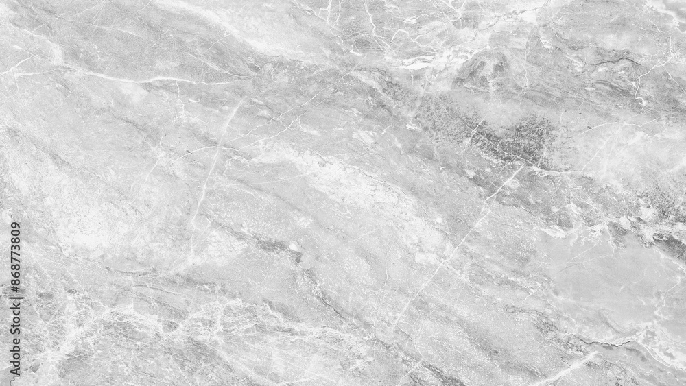 Aufkleber A large white marble slab with a greyish tint. The stone is smooth and has a slightly rough texture