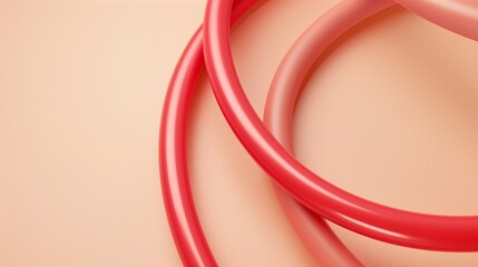 A close-up of the red curved tube on an abstract light pink and beige background.