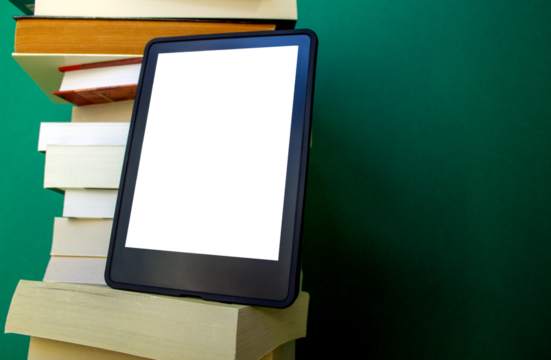 an electronic book next to a stack of paper books on a dark green background. one e-book replaces many regular books