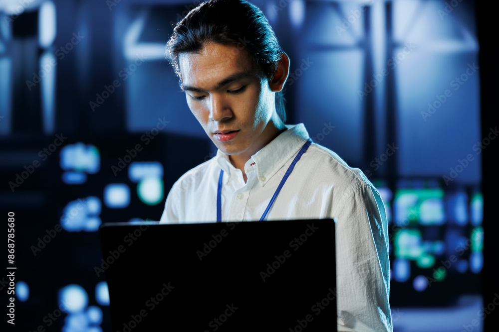 Aufkleber dara center manager running code and programming on laptop, troubleshooting and upgrading high tech 
