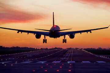 Plane Landing at Sunset