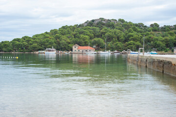 Obraz premium View from the beach on the island of Vrgada in Croatia during a cloudy summer day