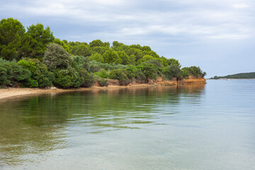 View from the beach on the island of Vrgada in Croatia during a cloudy summer day
