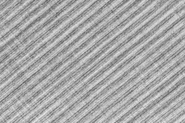 Ridge texture background of velour corduroy gray cloth. Large ribbed, diagonal coarse weaving...