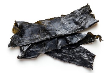 Roasted dried seaweed sheets seen from above on white background