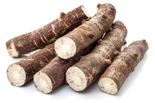 Stacked cassava on white background for tapioca flour or ethanol production top view