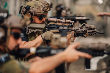 Group of extreme sport players shooting with rifles at opponent.