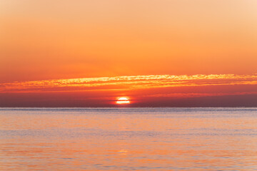Beautiful red and orange sunrise over the sea.