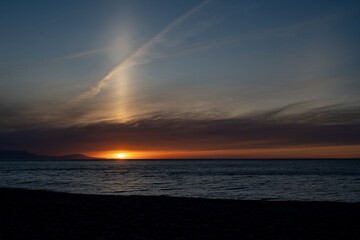Beautiful Sunset Over Tranquil Ocean Waves