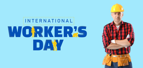 Mature worker on blue background. Labor Day celebration
