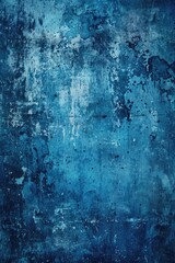 Obraz premium A worn-out blue wall with a rough texture and a hint of nostalgia
