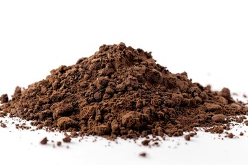 A small pile of earthy dirt on a clean white surface