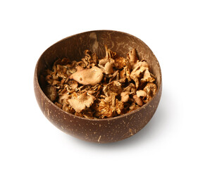 Brown bowl with tasty dried mushrooms on white background