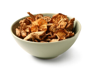 Green bowl with tasty dried mushrooms on white background
