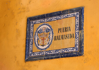 Fototapeta premium Decorative Doors, Decorative Door knockers, city signs and wooded reliefs in Charming City Streets in Historic Section of Cartagena Colombia Old Spanish Fort