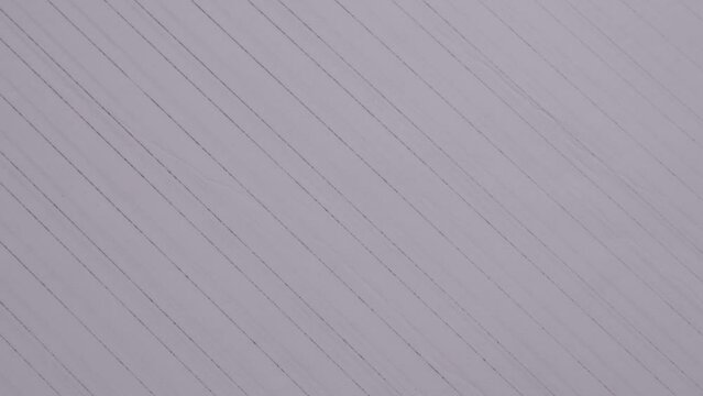 A white background with a grid of squares. The squares are of different sizes and are evenly spaced