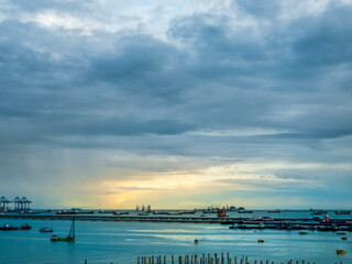 Obraz premium Logistic shipping quay boat Engineering crane depot at logistic export terminal control. Warehouse freight background container yard loading quayside harbor port. Logistics seascape shipping portal