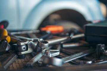 Mechanic tools engineering equipment car auto repair shop with copy space. Blurred background mechanical service. Heavy screw grungy rusted wrenches dirty screwdriver object. Industrial hardware set