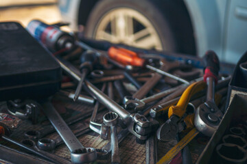 Mechanic tools engineering equipment car auto repair shop with copy space. Blurred background...