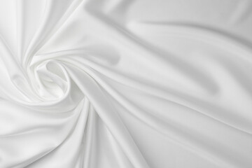 Obraz premium Texture of crumpled white silk fabric as background, top view