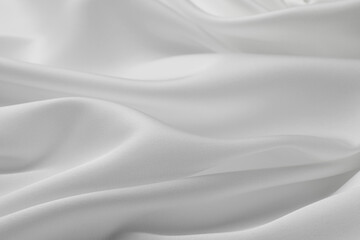 Naklejka premium Texture of crumpled white silk fabric as background, closeup