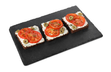 Delicious ricotta bruschettas with sliced tomatoes, olives and greens isolated on white
