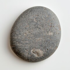 Smooth gray river stone on white background