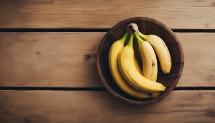 Top view of banana on a wooden bowl