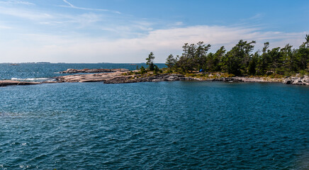 One of thousands of rocky islands in Georgian Bay, Lake Huron.  Many of these islands are available for overnight, canoe camping adventures.