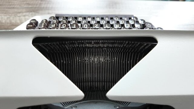 Close-up of a white, old typewriter, Łucznik 1303