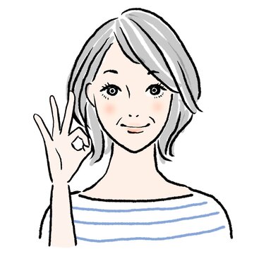 OKサインを出す中年女性