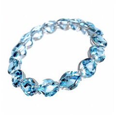 Elegant blue gemstone bracelet with sparkling, faceted stones, perfect for adding a touch of sophistication and glamour to any outfit.