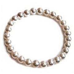 Obraz premium Elegant pearl bracelet with smooth spherical beads arranged in a perfect circle, reflecting light beautifully. Ideal for fashion and jewelry concepts.