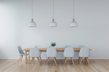 A minimalist dining room with a long wooden table, blue chairs, and three pendant lights hanging above.