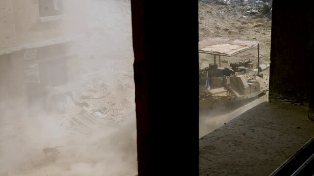 Looking out through house window of the Israeli battlefield vehicle Merkava Mark IV Barak tank on the streets during the Israel Hamas war conflict