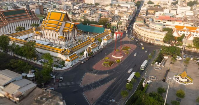 4k An Aerial view Hyperlapse Footage of the Red Giant Swing and Suthat Thepwararam Temple, The most famous tourist attraction in Bangkok, Thailand.