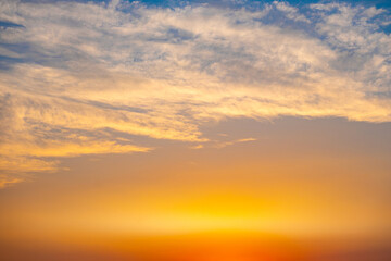 Enjoy a panoramic view of the skyline. The sun rises in the morning sky with colorful clouds. and beautiful cloud patterns In the soft light of the morning