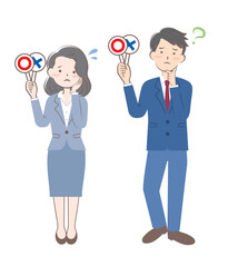 マルバツの札を持つスーツ姿の男女　正解　不正解　悩む