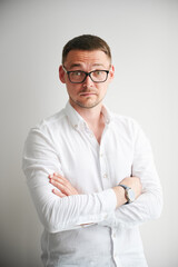 Portrait of man with raised eyebrows, which may suggest curiosity surprised or questioning attitude...