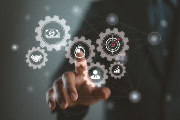 Business process management and workflow automation diagram with gears and icons with connection line network in background. Manager touching interface