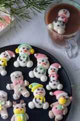 Christmas marshmallows. Winter candy. Sweet food in december. Snowman and Santa Claus