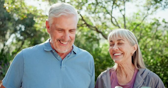 Senior couple, yoga mat and walk park on grass with conversation, memory or joke in summer. Retirement, woman and man on path in backyard at house for health, wellness and chat with water in Canada