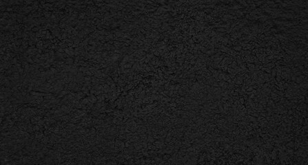 black psychedelic abstract background. flakes of paint on concrete wall