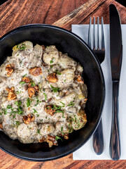 A serving of Potato Gnocchi in a creamy sauce