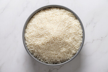 Top View of Jasmine rice, a staple food of Thai people, in a gray bowl